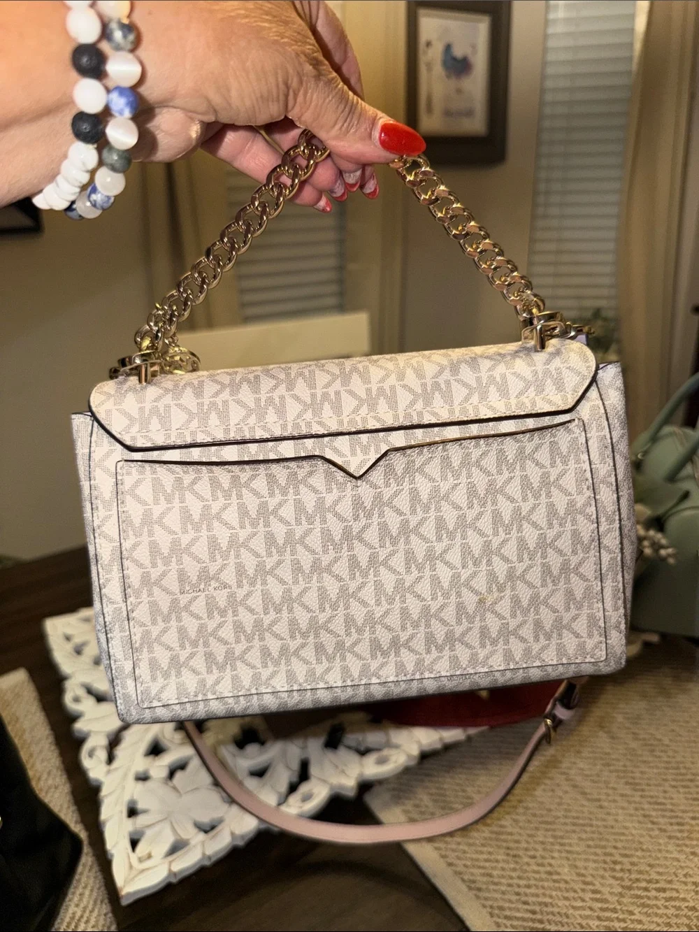 Michael Kors Lita Medium Two-Tone Logo Crossbody Bag in a powder blush